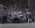 Volters with flags and cardboard banners in a tunnel